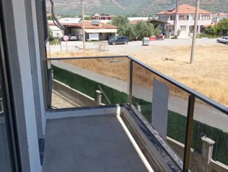 1 1 Wohnung Zu Verkaufen Mit Pool In Ortaca Karaburun Nachbarschaft