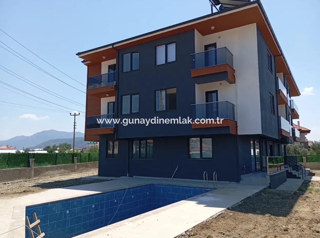 1 1 Apartment For Sale With Pool In Ortaca Karaburun Neighborhood